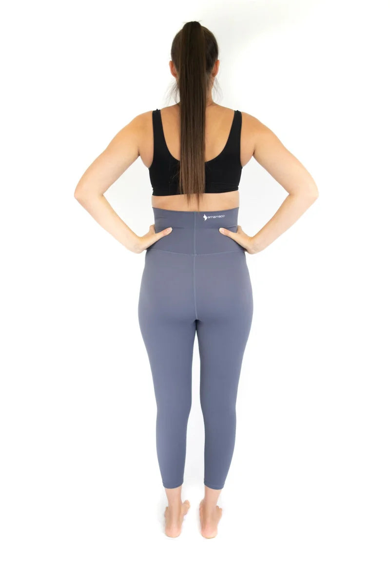 Woman in workout attire showcasing Emamaco Maternity Leggings from the back