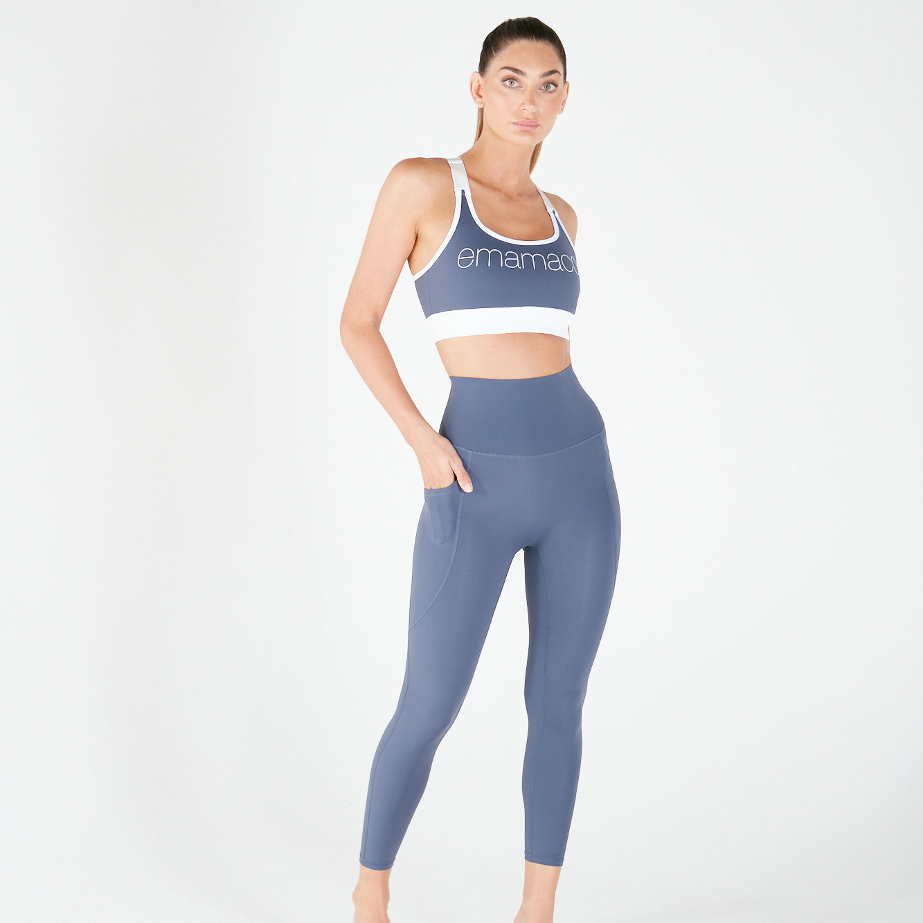 Woman in blue athletic activewear featuring Shaper Move Leggings with pockets