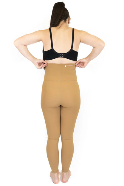 Woman in Emama Maternity Leggings, Caramel color, viewed from behind for final sale