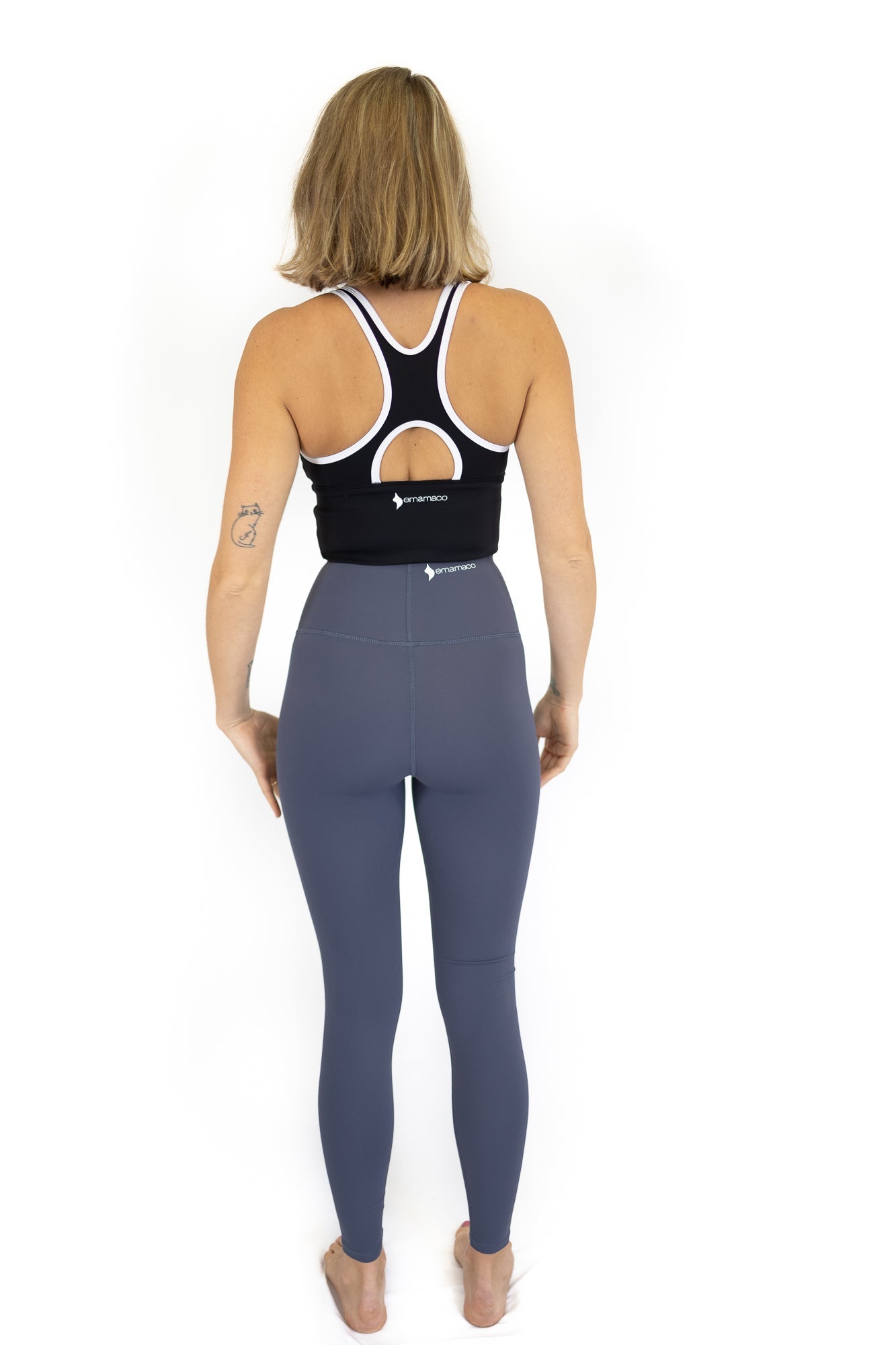 Woman in athletic activewear showcasing Shaper Move Leggings - Twilight in full length