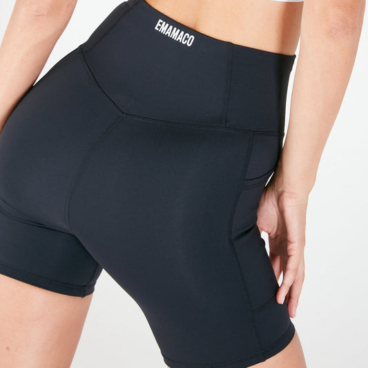 Black high-waisted Vibe V Shorts with EMANACO branding, perfect v-back bike shorts